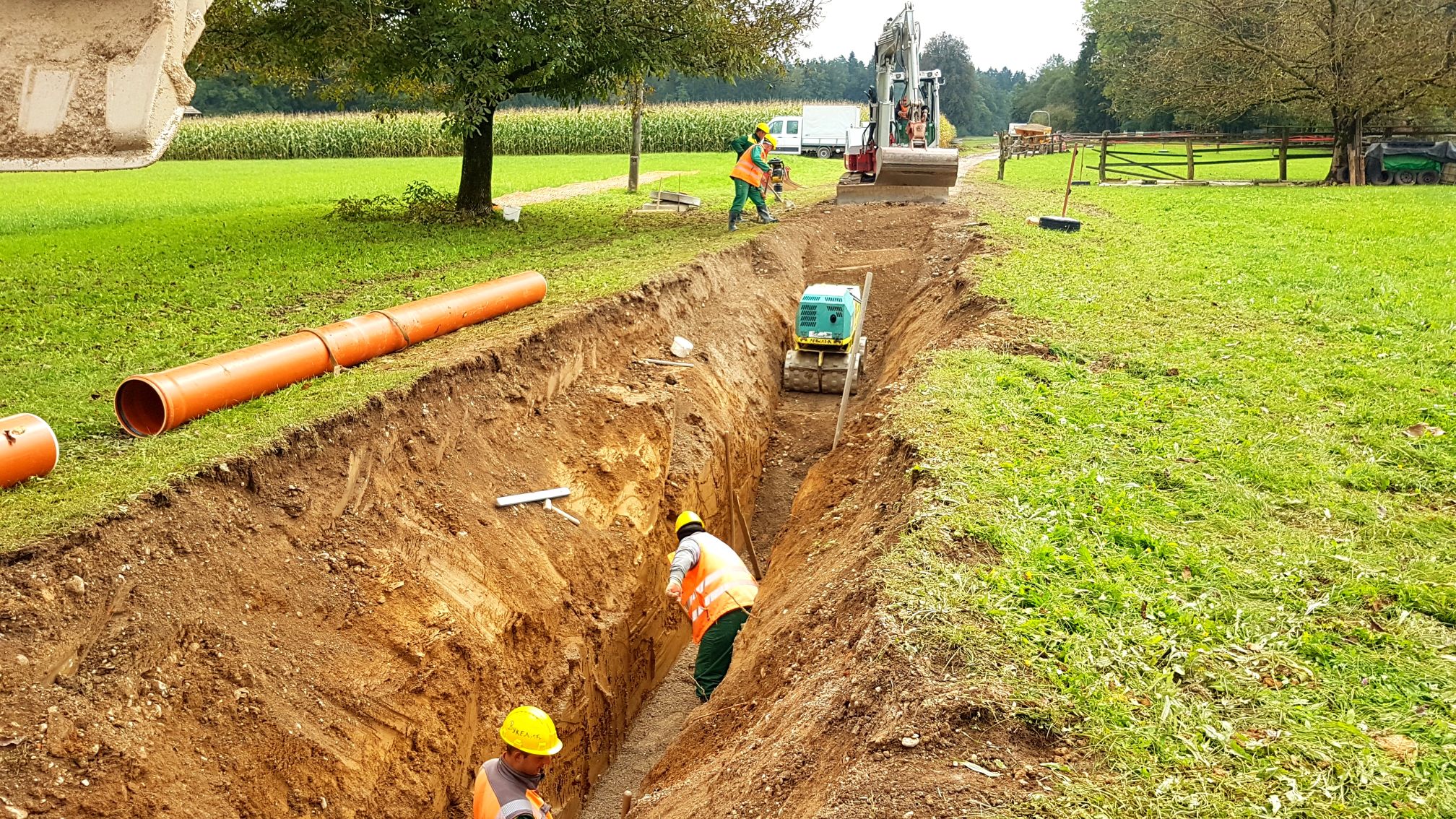 Trenching and pipe laying
